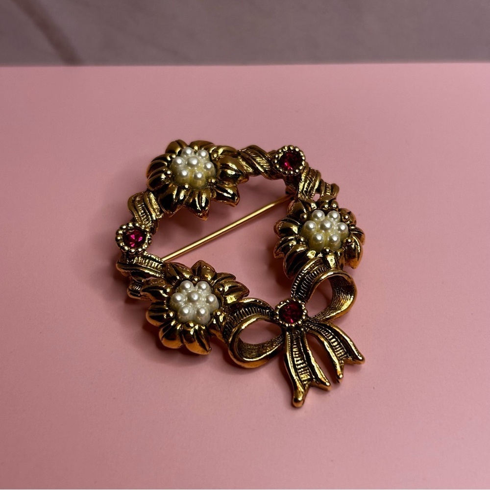 Avon Gold Tone Red Rhinestone Floral Brooch